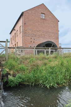 Modern Screener in Old Water Mill Produces High-Quality Flour