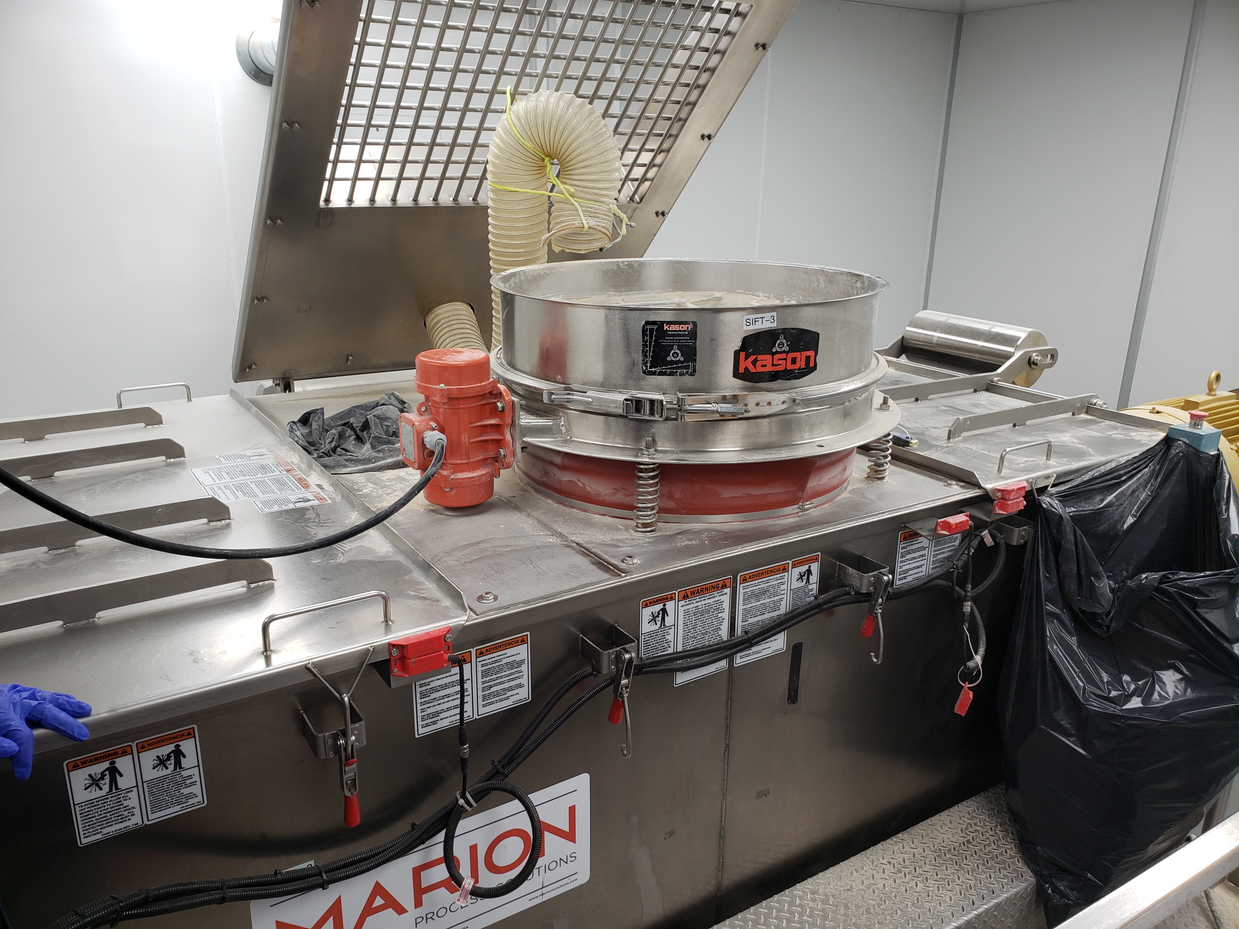 Kason VIBROSCREEN Circular Vibratory Screener paired with a Marion Horizontal Batch Mixer